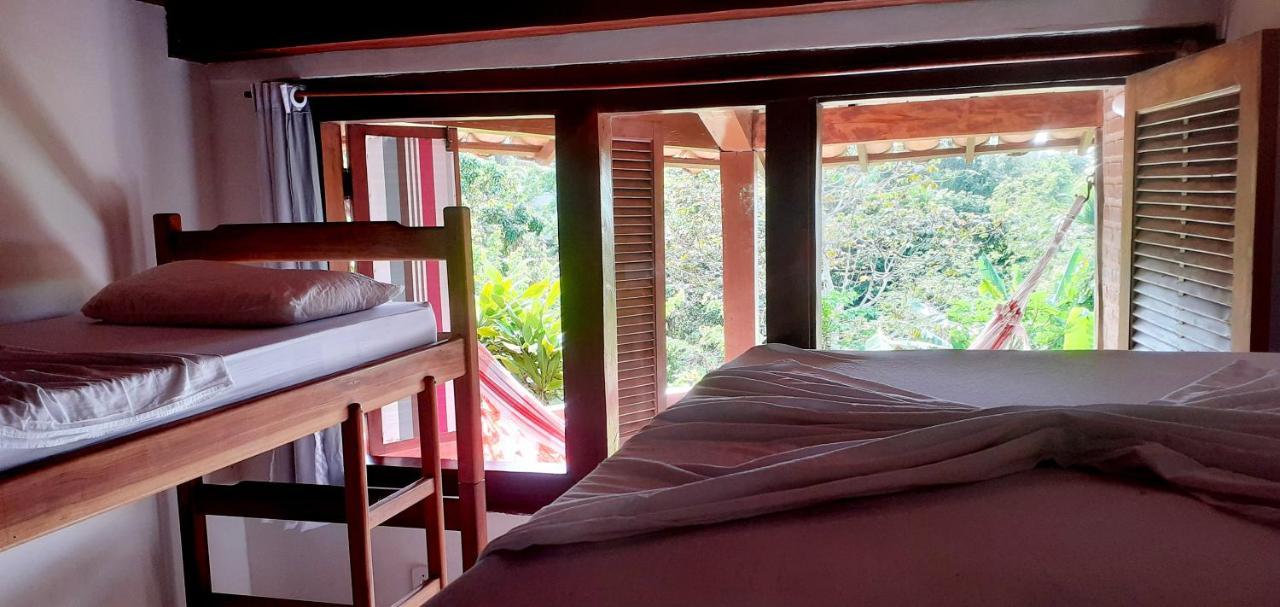 Novos Baianos Hostel E Pousada Porto Seguro Eksteriør bilde A room at the hostel