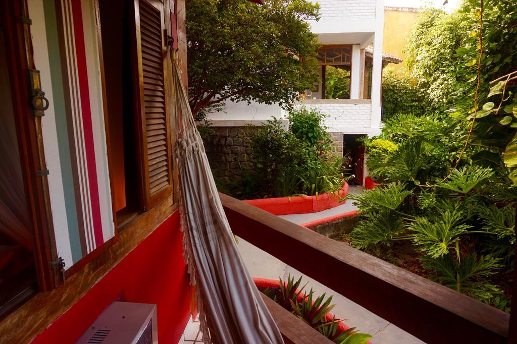 Novos Baianos Hostel E Pousada Porto Seguro Eksteriør bilde A hammock in a hotel in Tulum, Mexico